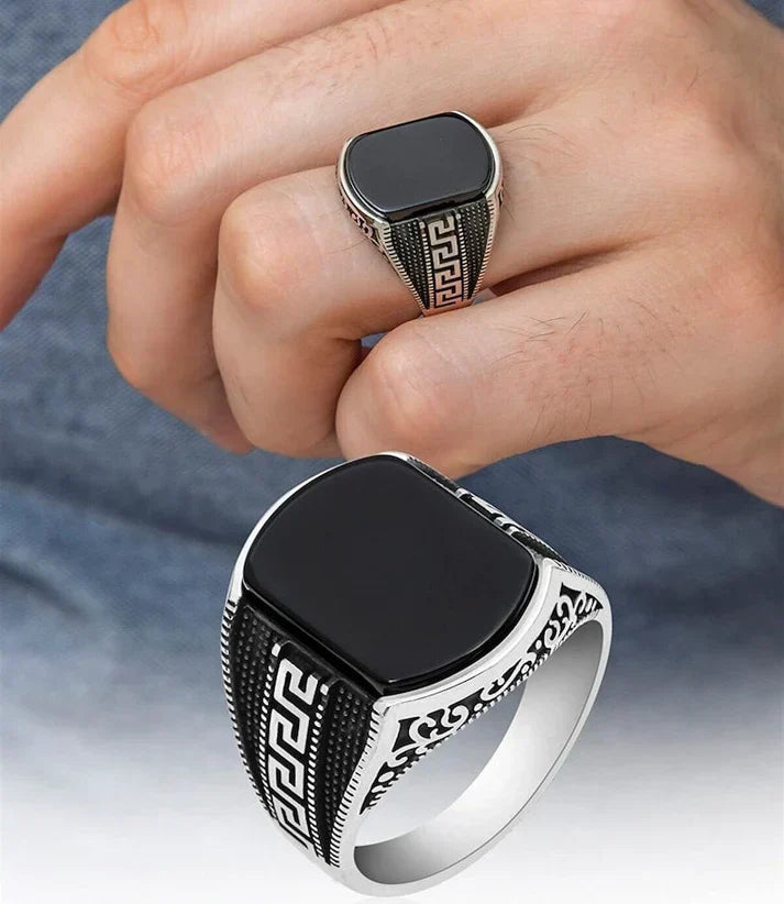 Silver medusa small pattern ring for men featuring black stone and intricate side designs