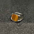 Turkish onyx riger ring for men in pakistan with a yellow stone and silver detailed band
