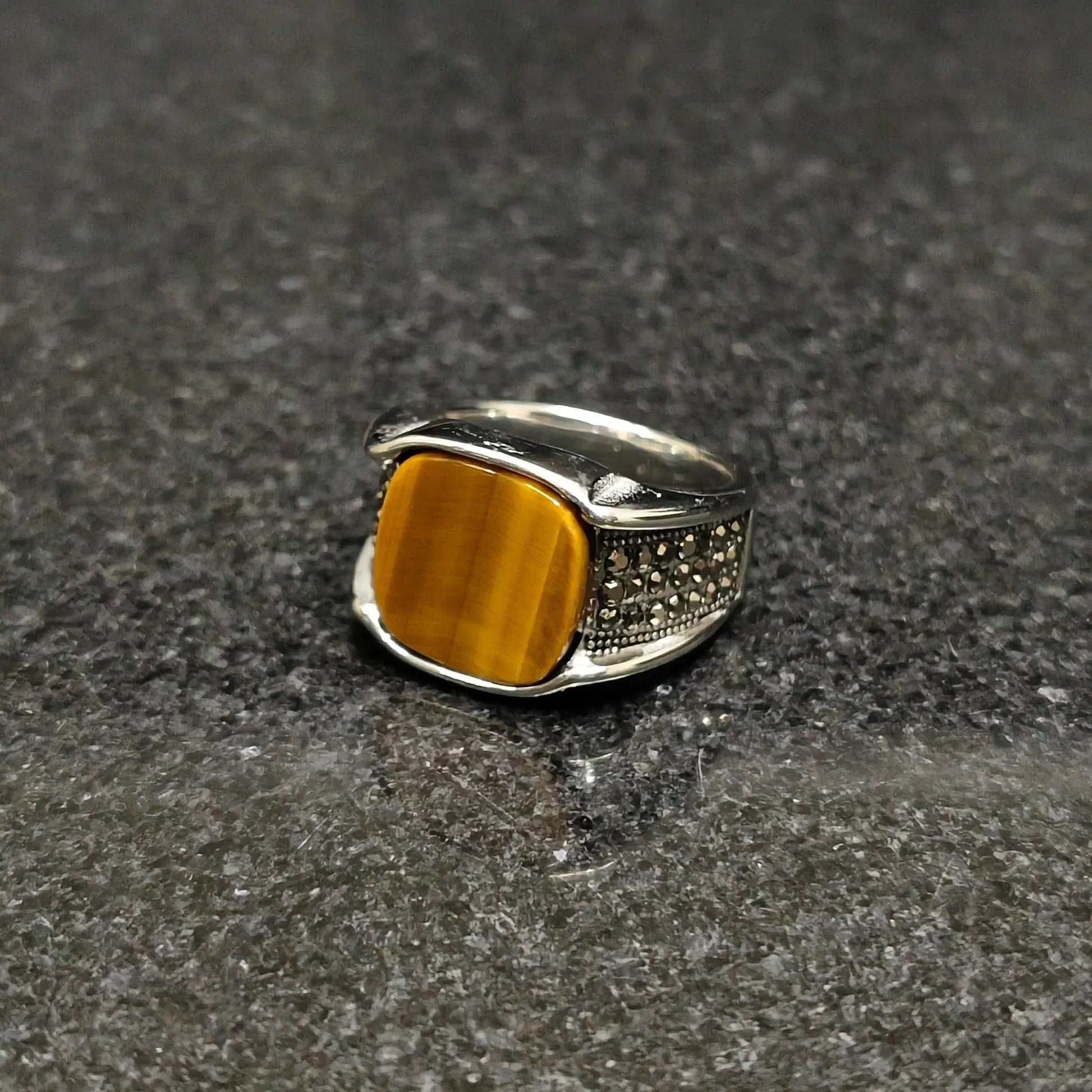 Turkish onyx riger ring for men in pakistan with a yellow stone and silver detailed band