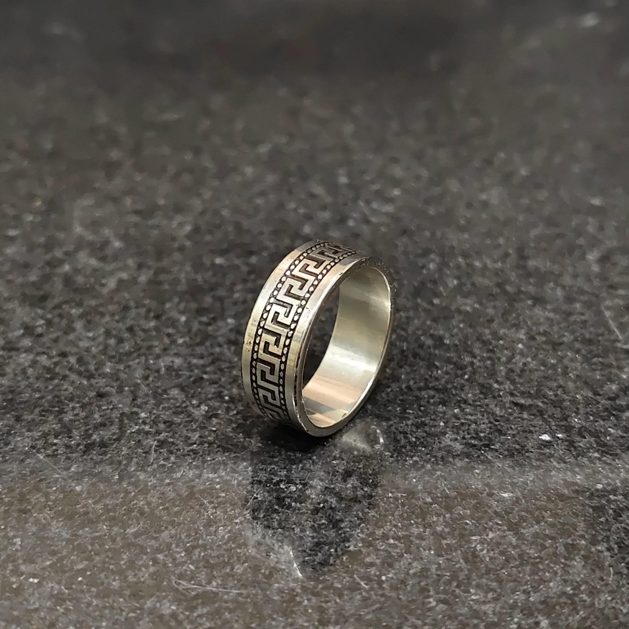 Versace Pettern Black ring for men with intricate Greek key design on silver band