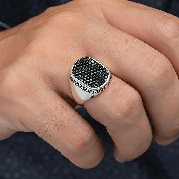 Silver Versace Ring For Men with black stone detailing and Greek key design on a hand